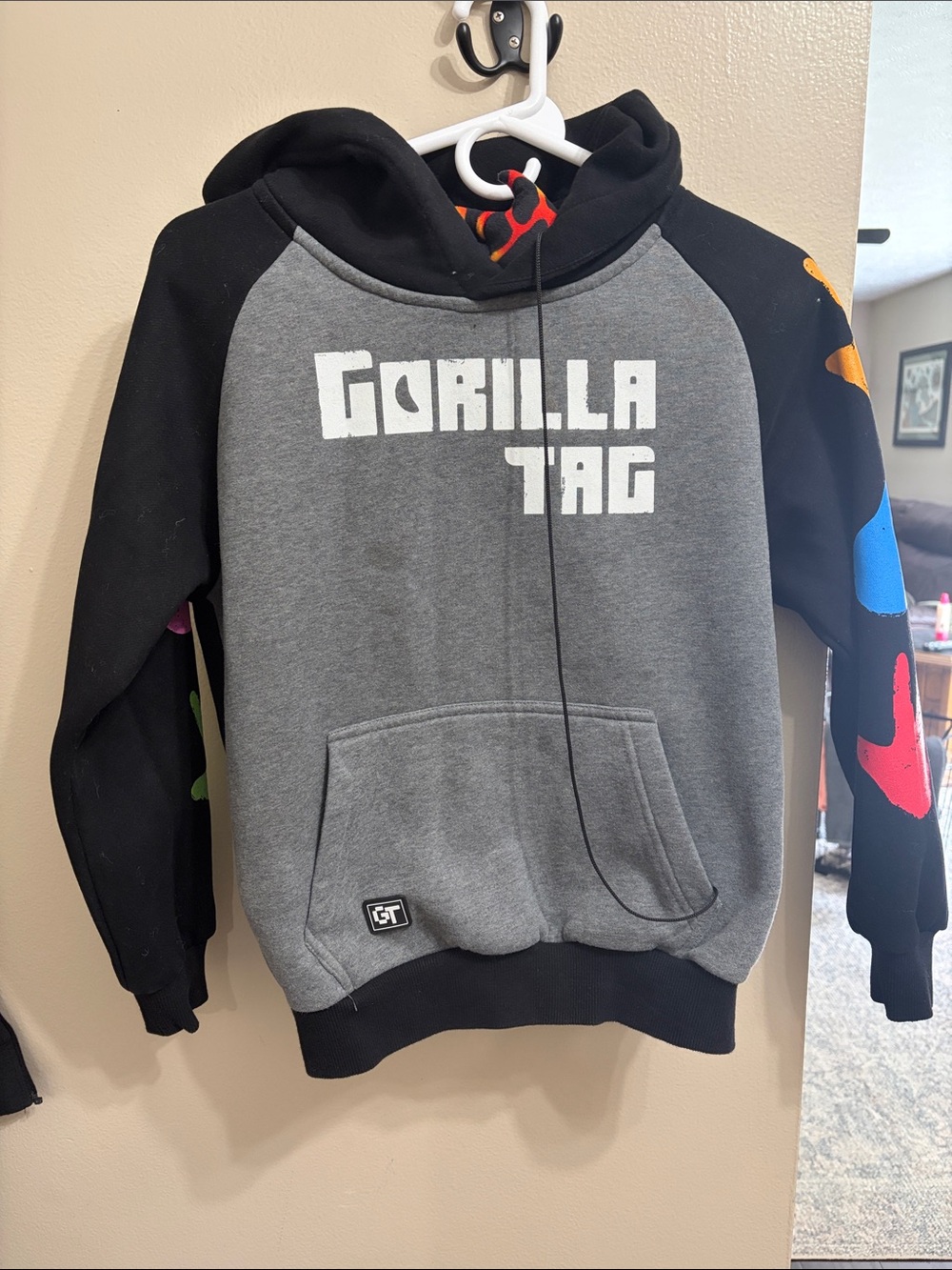 Genuine Gorilla Tag Logo Hoodie - includes a toy strapped to the hoodie.